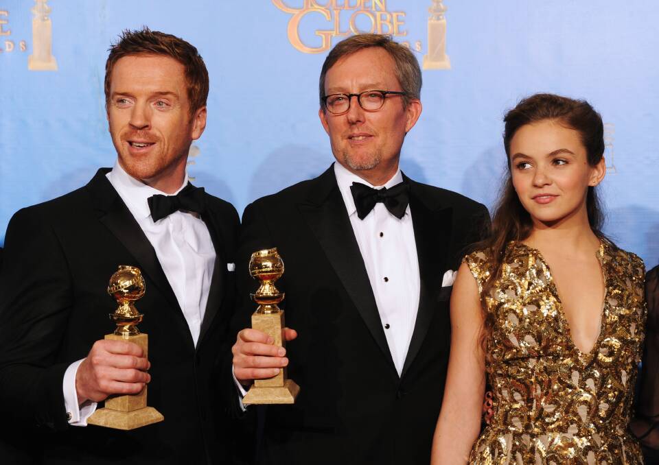 Actor Damian Lewis, producer Alex Gansa and actress Morgan Saylor of 'Homeland,' winner of Best Television Series (Drama). Photo by Kevin Winter/Getty Images