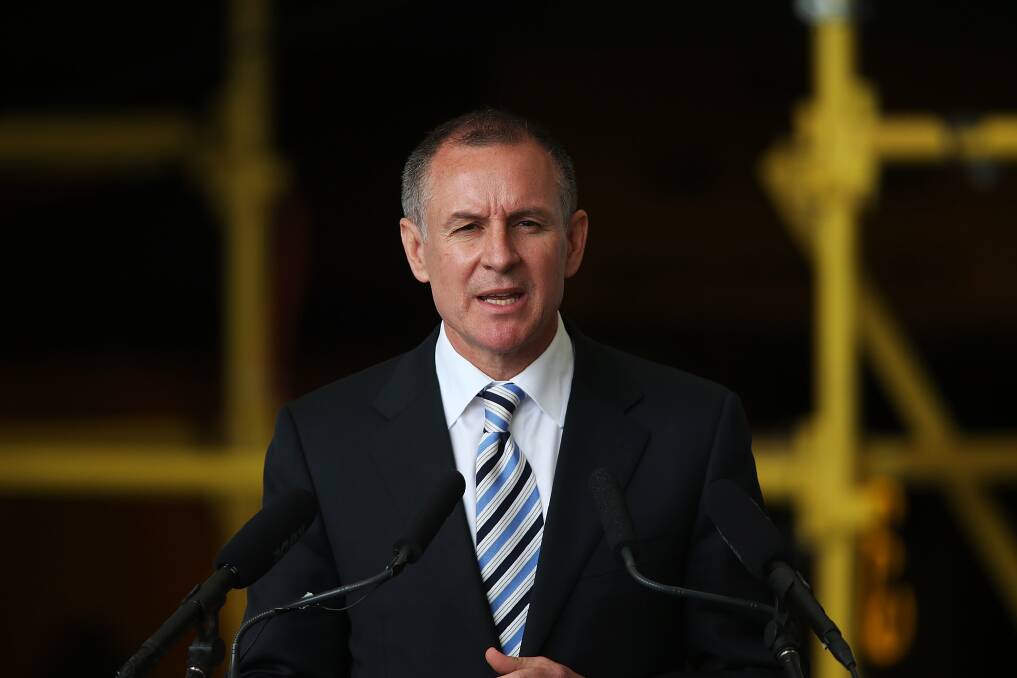 South Australian Premier Jay Weatherill speaks at the ASC facilities during a visit from U.S. Secretary of State Hillary Clinton in Adelaide, Australia. Secretary Clinton is in South Australia to tour the Techport maritime defence facility and meet with the Governor and Premier of the state. Photo by Morne de Klerk/Getty Images