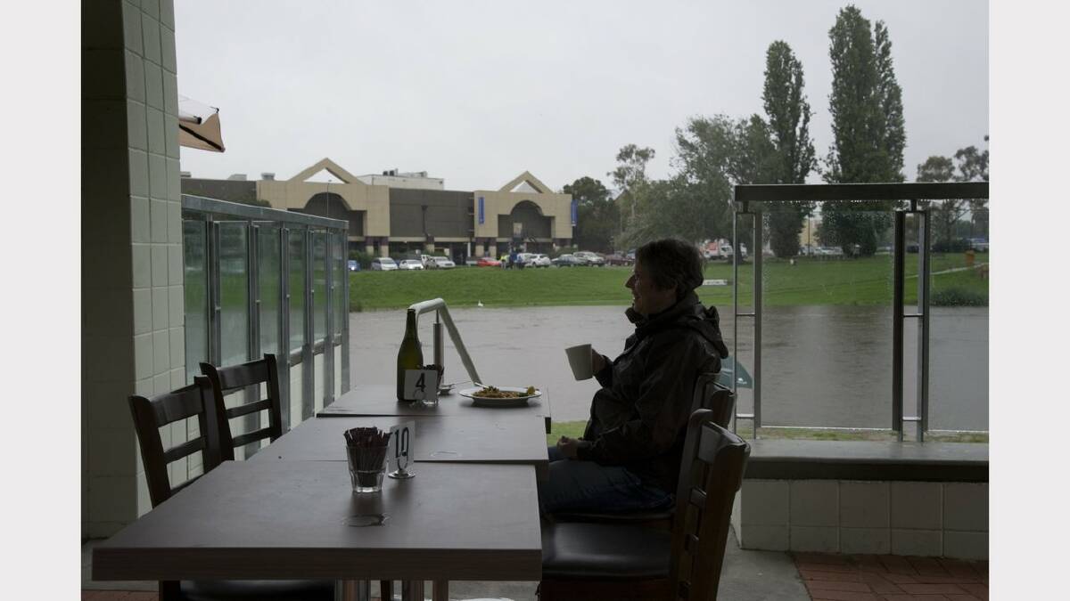 Margie Andrew of Queanbeyan at the Riverside Cafe when the town was by floods in March. Photo: Elesa Lee.