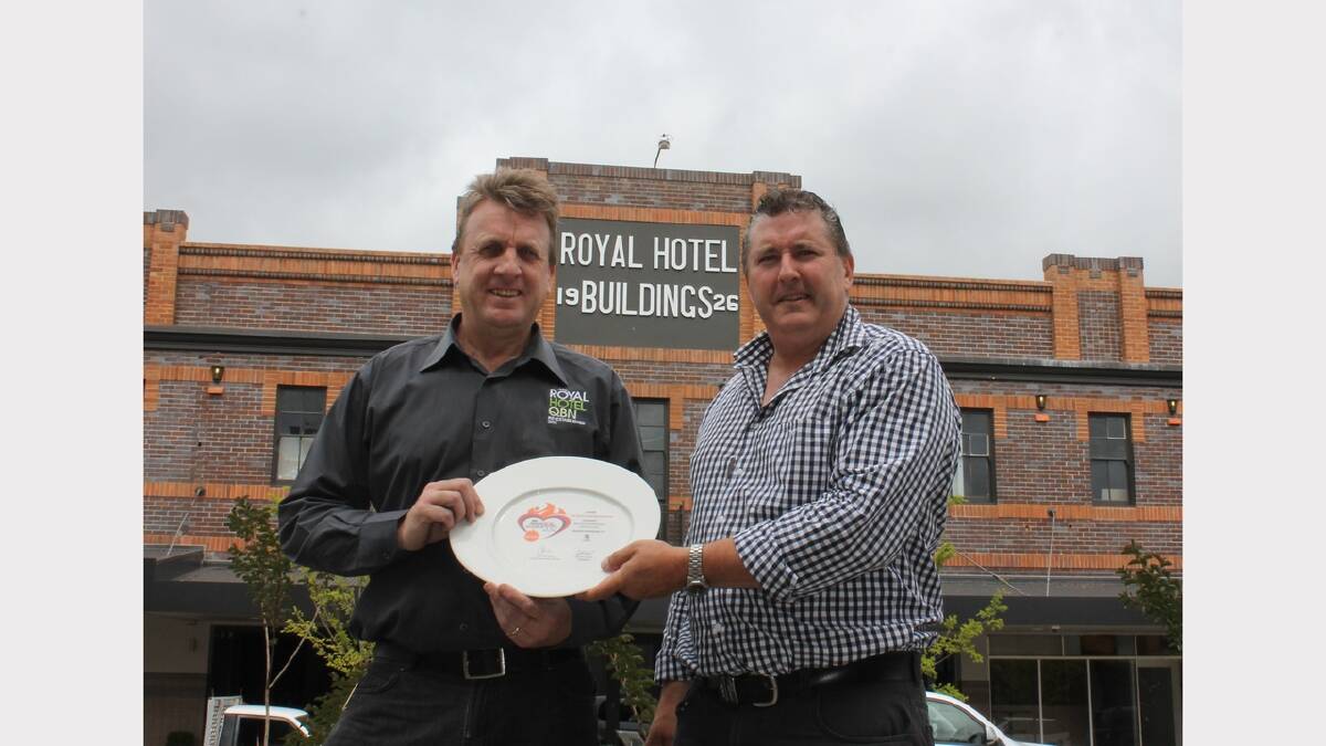 Royal hotel manager Adrian Sandrey and owner Peter Griffiths with the award for Best Redeveloped Hotel in country New South Wales.