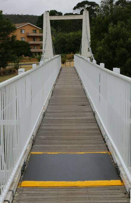 The Suspension Bridge was closed for two days while Queanbeyan Council workers fixed damage to the walk way.