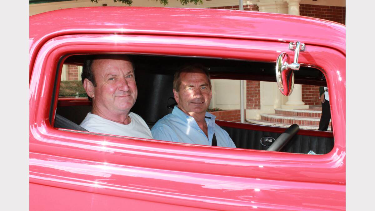 Hot-rodder Brian Carvolth and mayor Tim Overall take a spin in a 1932 Ford Coupe.