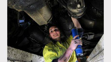 Queanbeyan's Sarah Thompson became a qualified heavy vehicle mechanic after completing her apprenticeship in June. Photo: Graham Tidy.