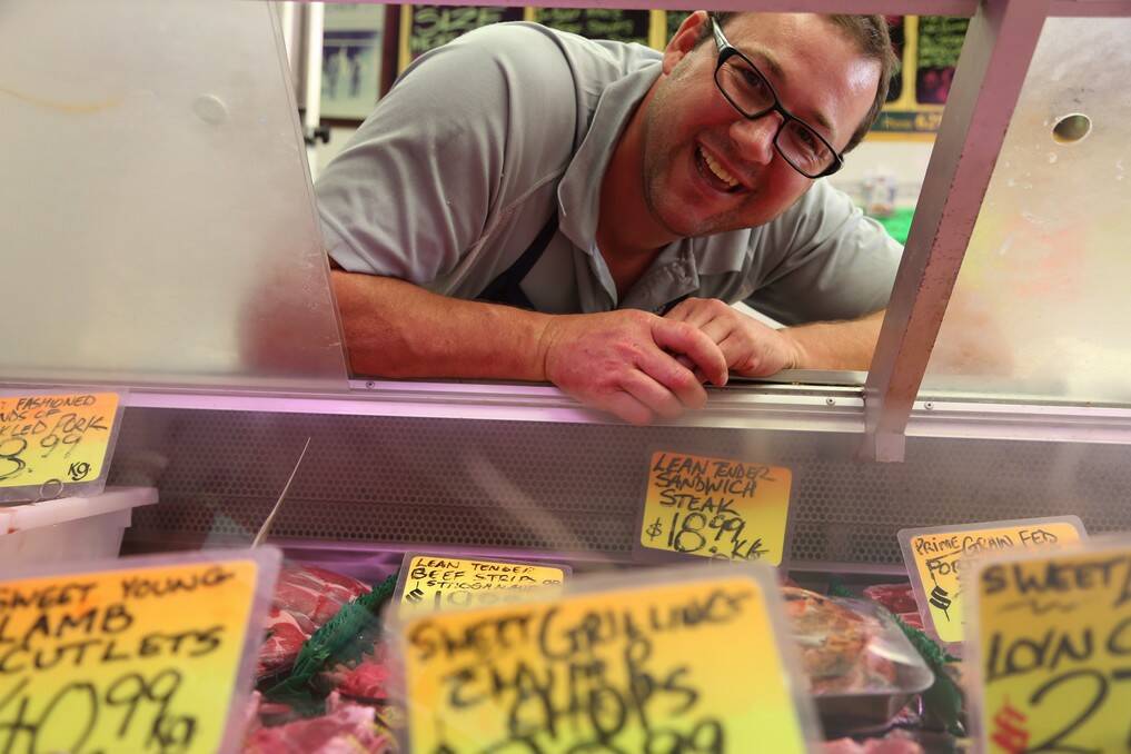 Jamie Cole of Lindbeck's Butchery is expecting to sell three times the usual amount of lamb this week as locals prepare for Australia Day. Photo: Kim Pham. 				