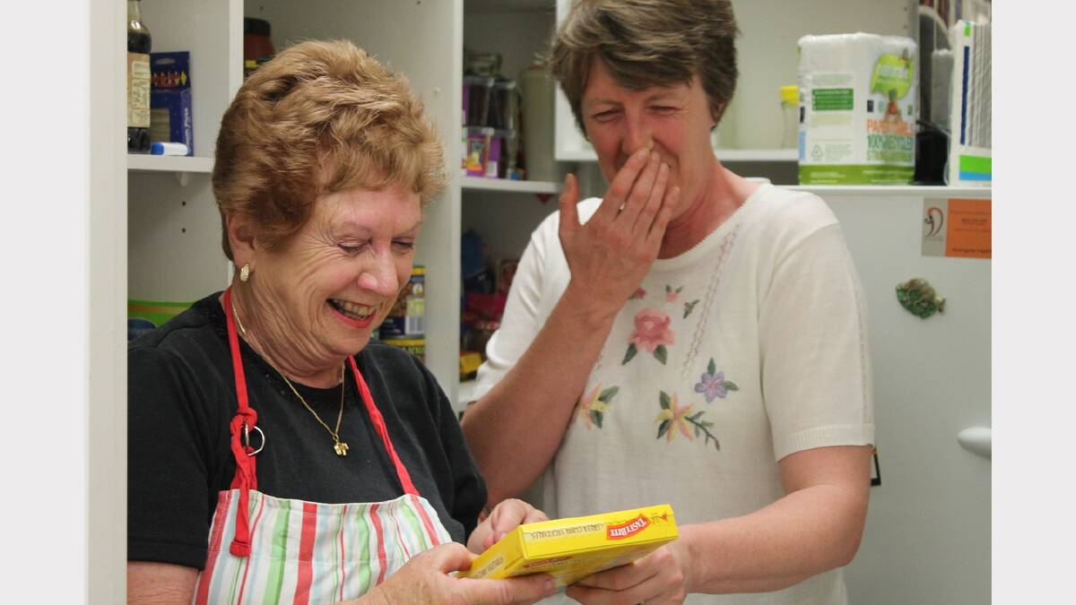 Volunteer Margaret Payne and co-ordinator Elaine Lollback stir up some fun in the St. Benedicts kitchen. Photo: Serena Coady.