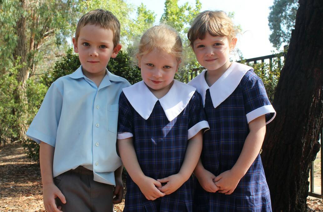 Luke, Kasey and Eve of St Greg's Primary School.
