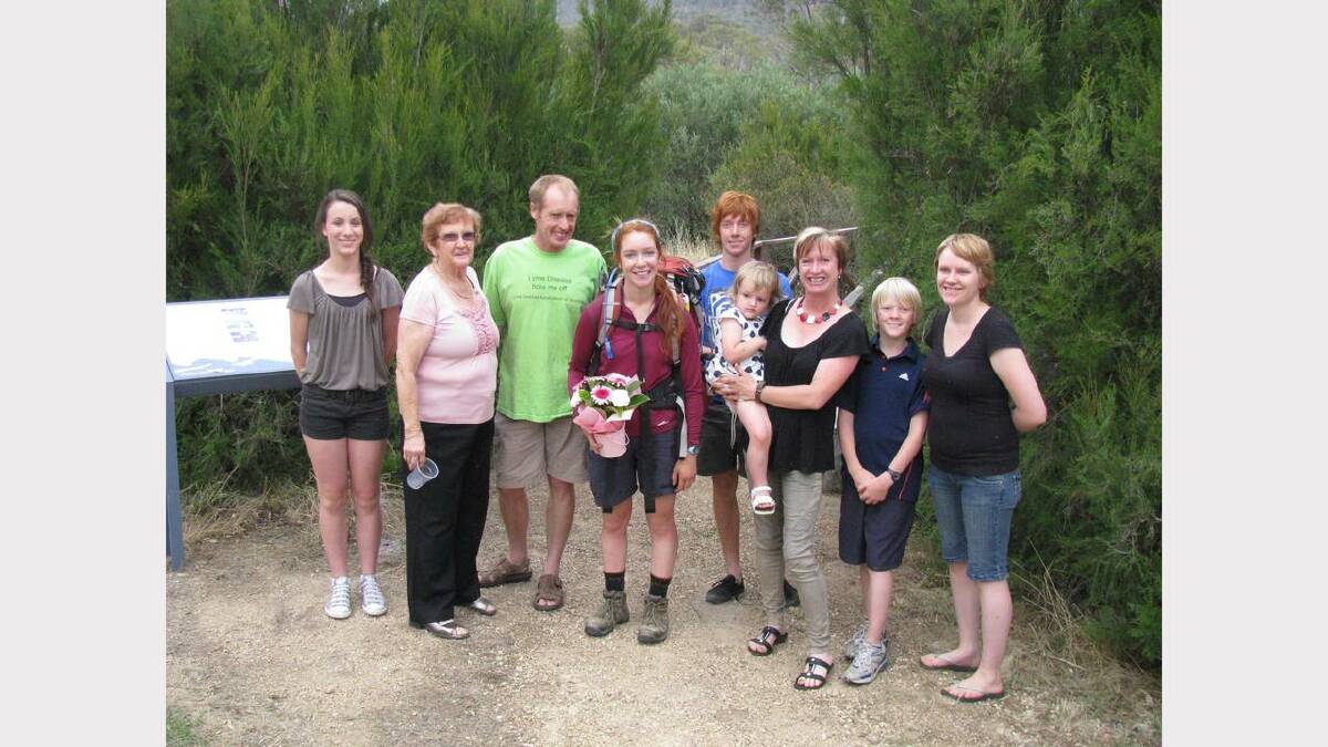 Carwoola teenager Ally Durr (centre) surrounded by family and friends at the conclusion of her trek. Photo: supplied.