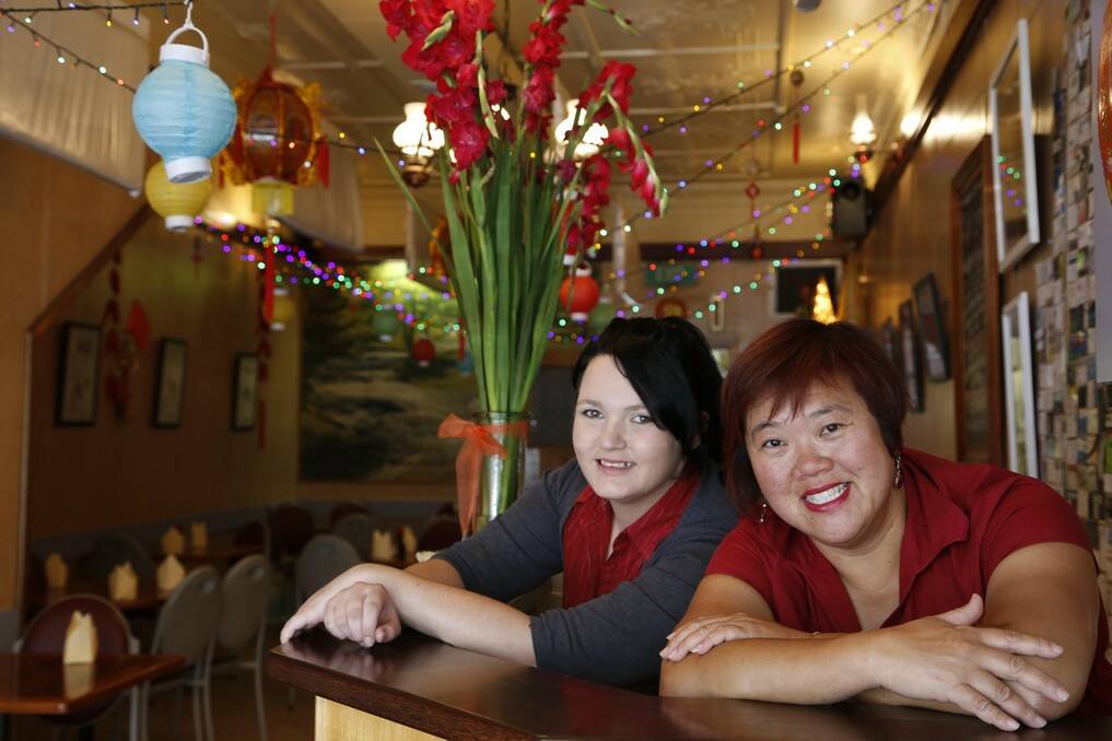 Canton Chinese Restaurant's Kayla Blundell and Vanessa SeeToh are travelling to Cambodia to help with the Tabitha Foundation's house building project. Photo: Kim Pham.