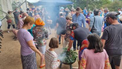 Members of the Goulburn community were invited to take part in the smoking ceremony. Picture: Dominic Unwin