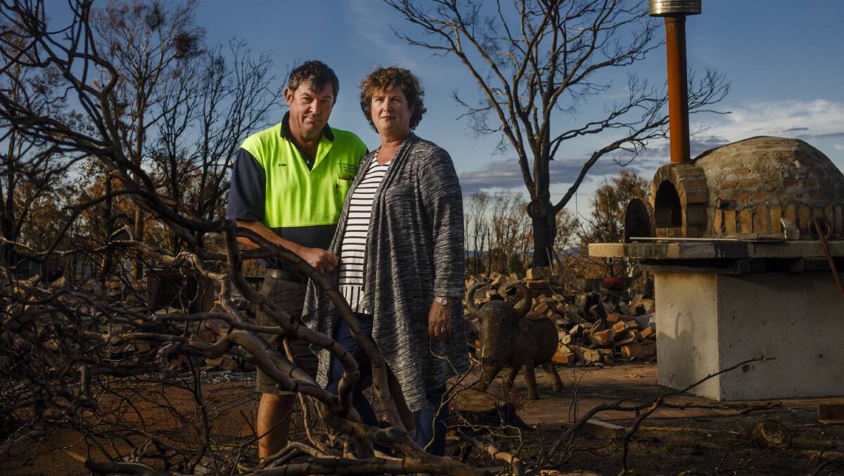 Vanessa and Kevin Lindley are still waiting to finalise insurance claims two months after a bushfire gutted their home in Carwoola. Photo: Sitthixay Ditthavong