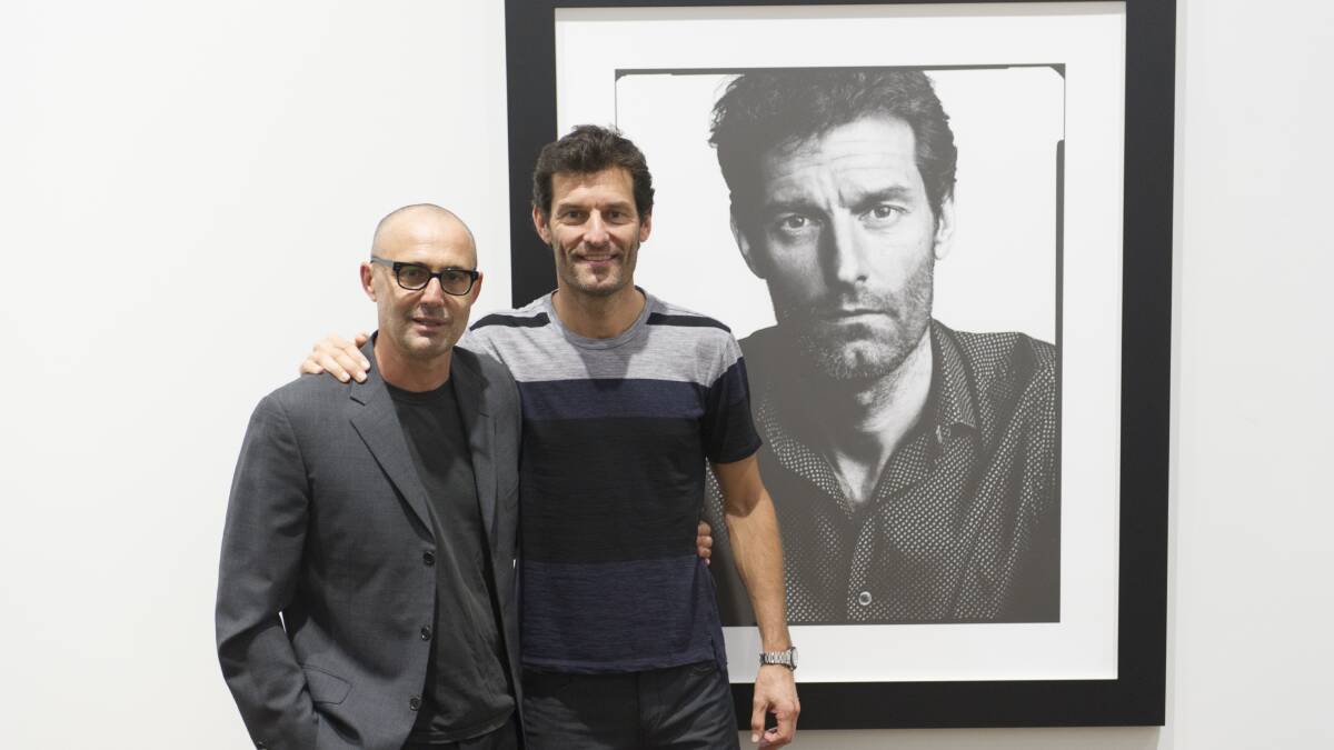 STARS ALIGN: Formula One champion Mark Webber with photographer Gino Zardo in front of his portrait, which will be in the National Portrait Prize 2017 exhibition. Photo Jay Cronan
