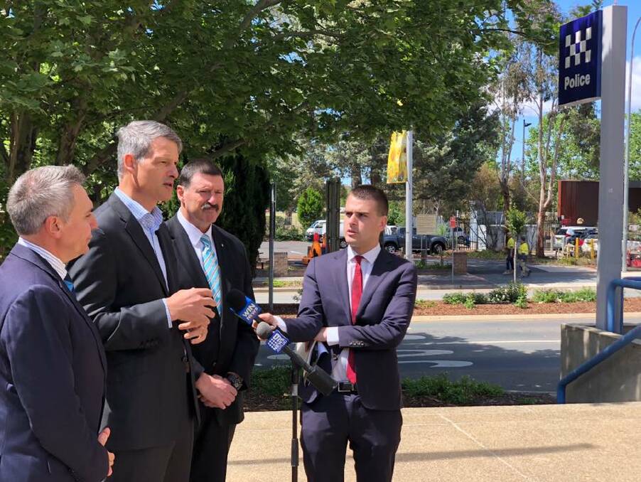 Monaro Labor candidate Bryce Wilson (second left) at the Queanbeyan Police Station with shadow police minister Guy Zangari (right) and Eden-Monaro MP Dr Mike Kelly (second from right).
