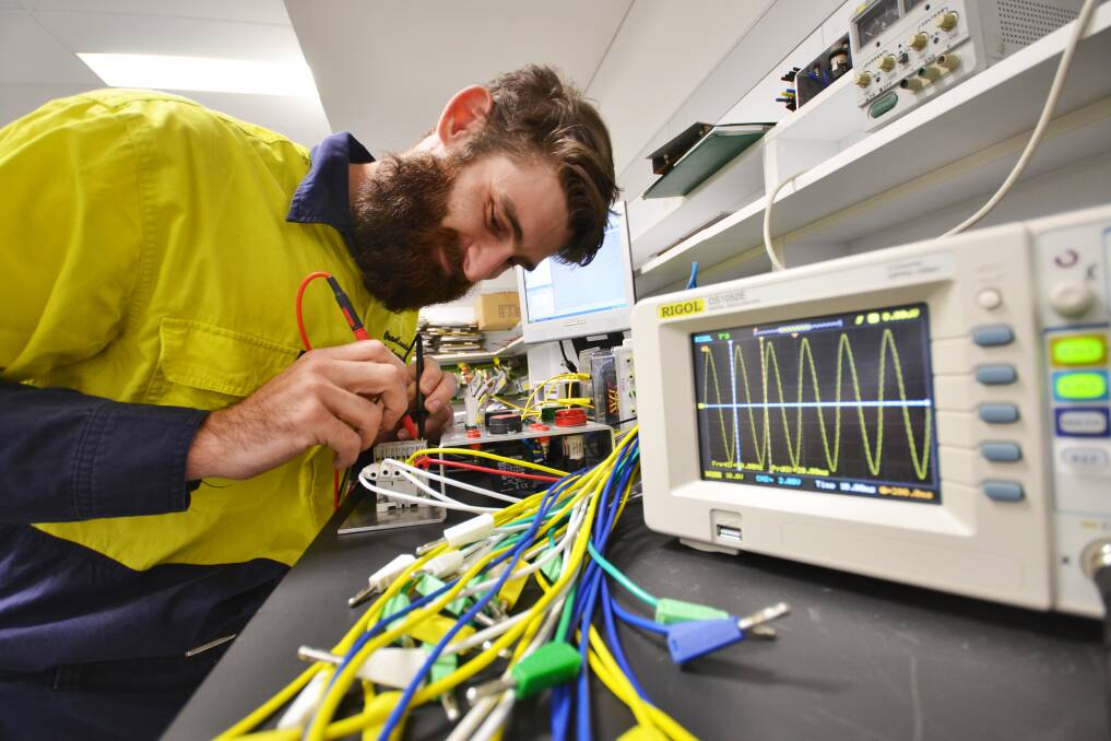 At home amoung wires: Electrical engineer and university graduate Matthew Conley is in demand now he has undertaken an electrical apprenticeship with TAFE NSW. Picture: Supplied. 