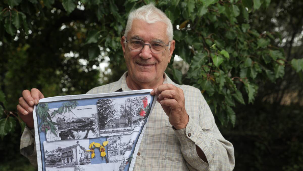 QUEANBEYAN CLOTH: Jean-Pierre Favre with the tea towel he drew sketches for. Photo: James Hall.