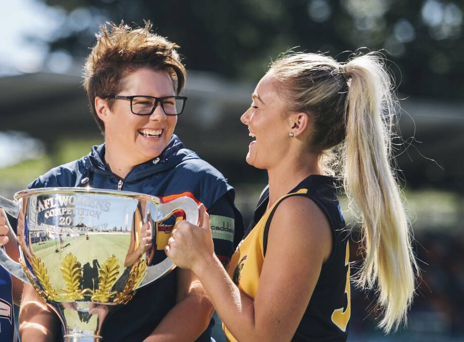 Adelaide Crows coach Bec Goddard and Queanbeyan's Ella Ross with the 2017 premiership cup. Photo: Rohan Thomson.