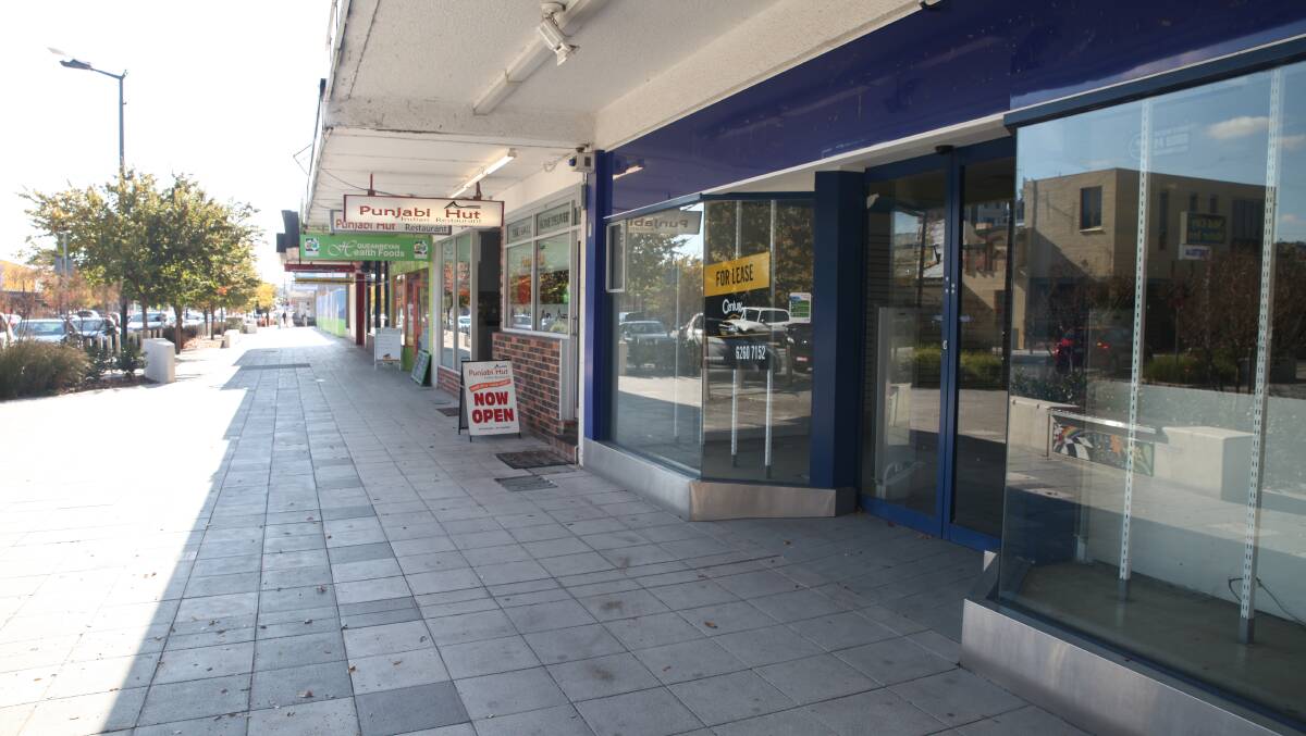 Empty store fronts and empty sidewalks in Queanbeyan's centre. Photo: James Hall.