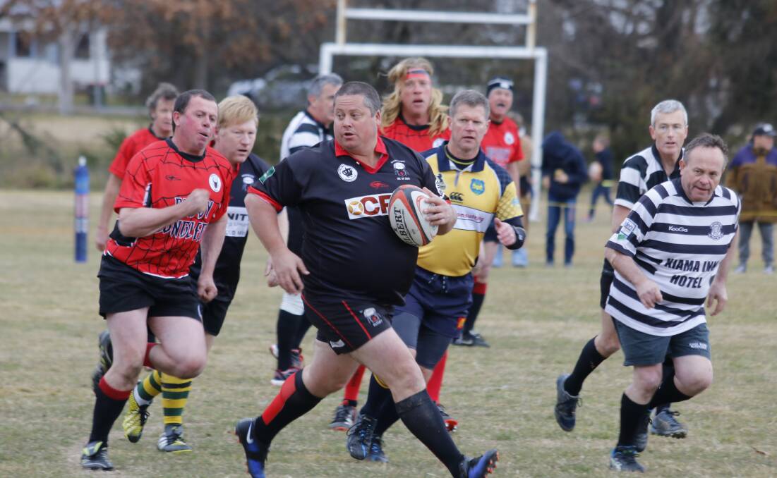  Action from last year’s Daddy Long Legs game against Kiama with a rampaging Barry Osmond.Photo: suppleid