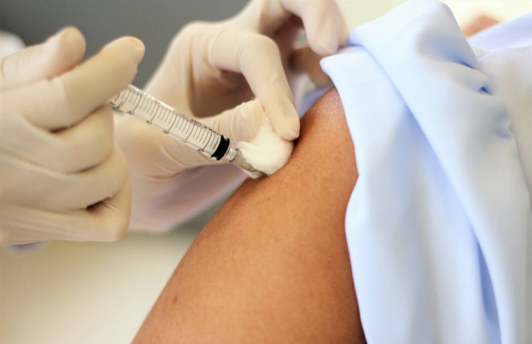 People are being urged to book in for a COVID-19 vaccination. Image: Shutterstock.