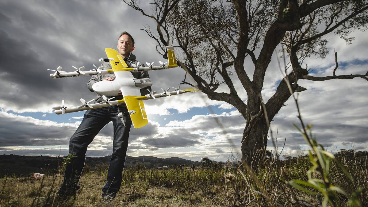 Project Wing co-leader James Ryan Burgess with the delivery drone set to be trialled at Fernleigh Park.  Photo: Sitthixay Ditthavong