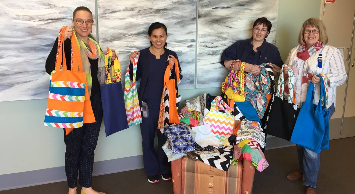 Lori Mancell, Grail de Mayo, Stephanie Guido and Nicole Lyons at Queanbeyan Hospital for the handover of the bags.