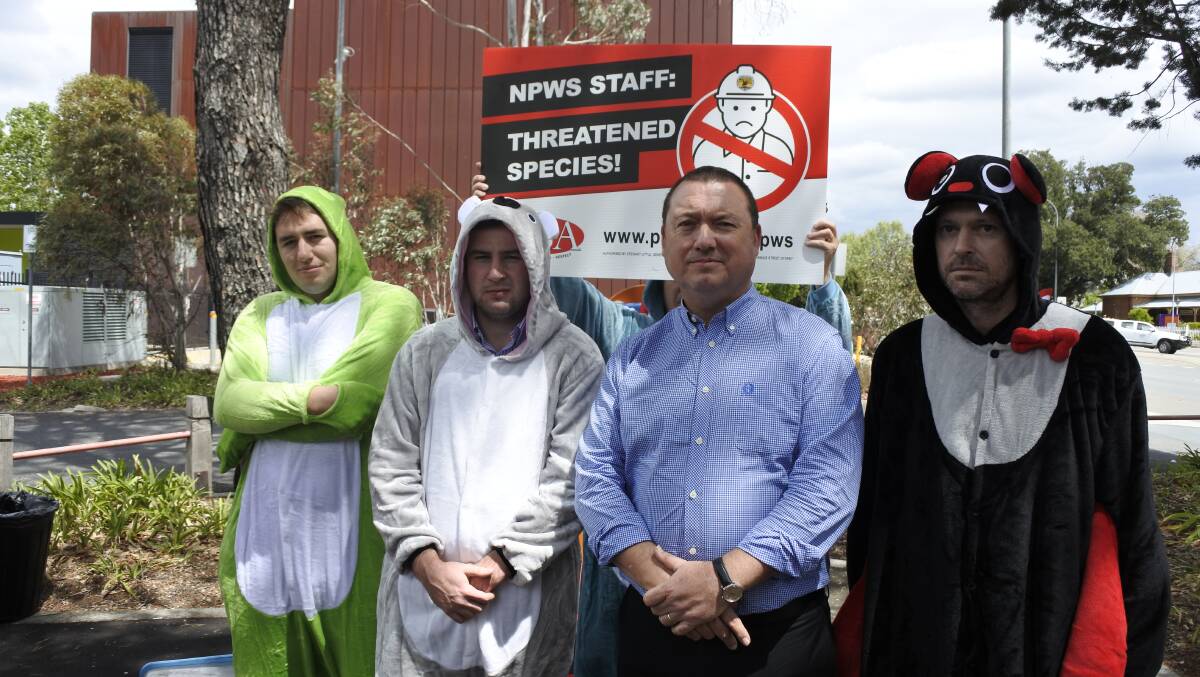 General Secretary of the Public Service Association Stewart Little was joined by some onesie-clad protesters to represent the threatened species that could be in danger with NPWS job cuts.