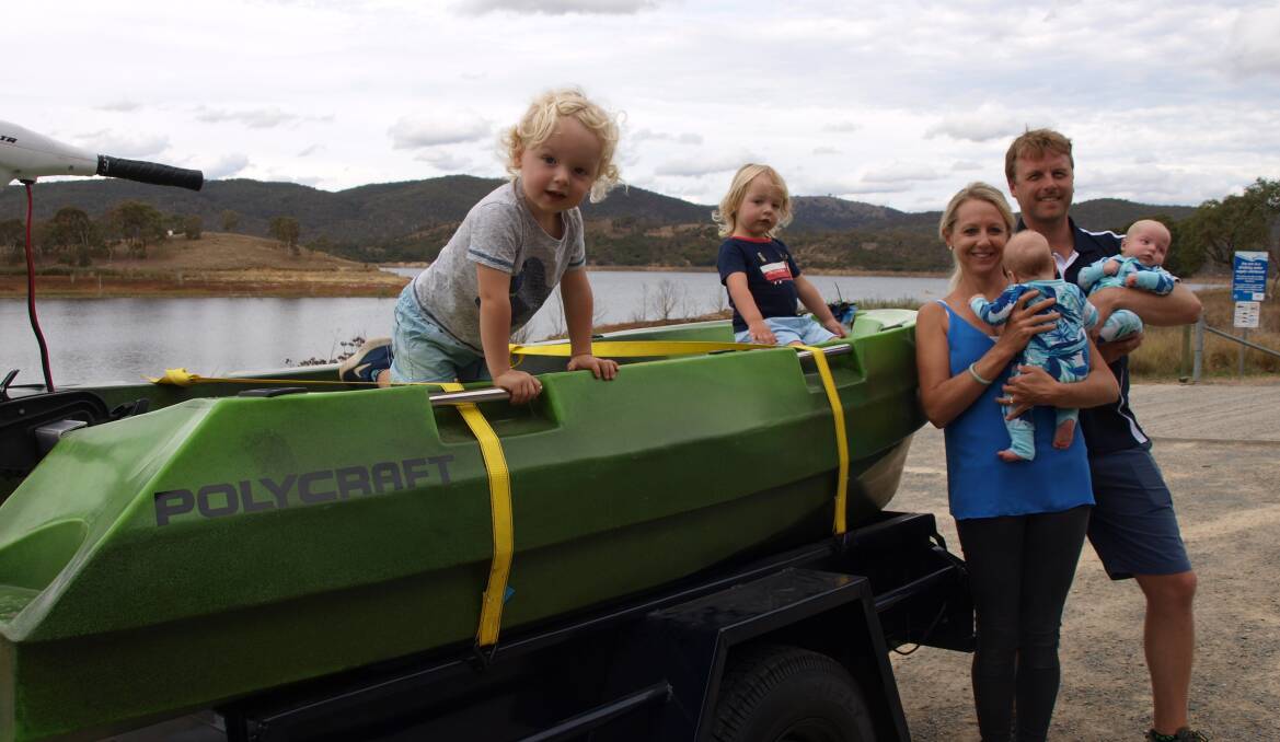 Kane and Amanda Hardy with twins Lincoln and Riley (2), and babies Beau and Harry (4 months). The family hope their line of plastic boats will be available for rent on Googong Dam. Photo: Supplied