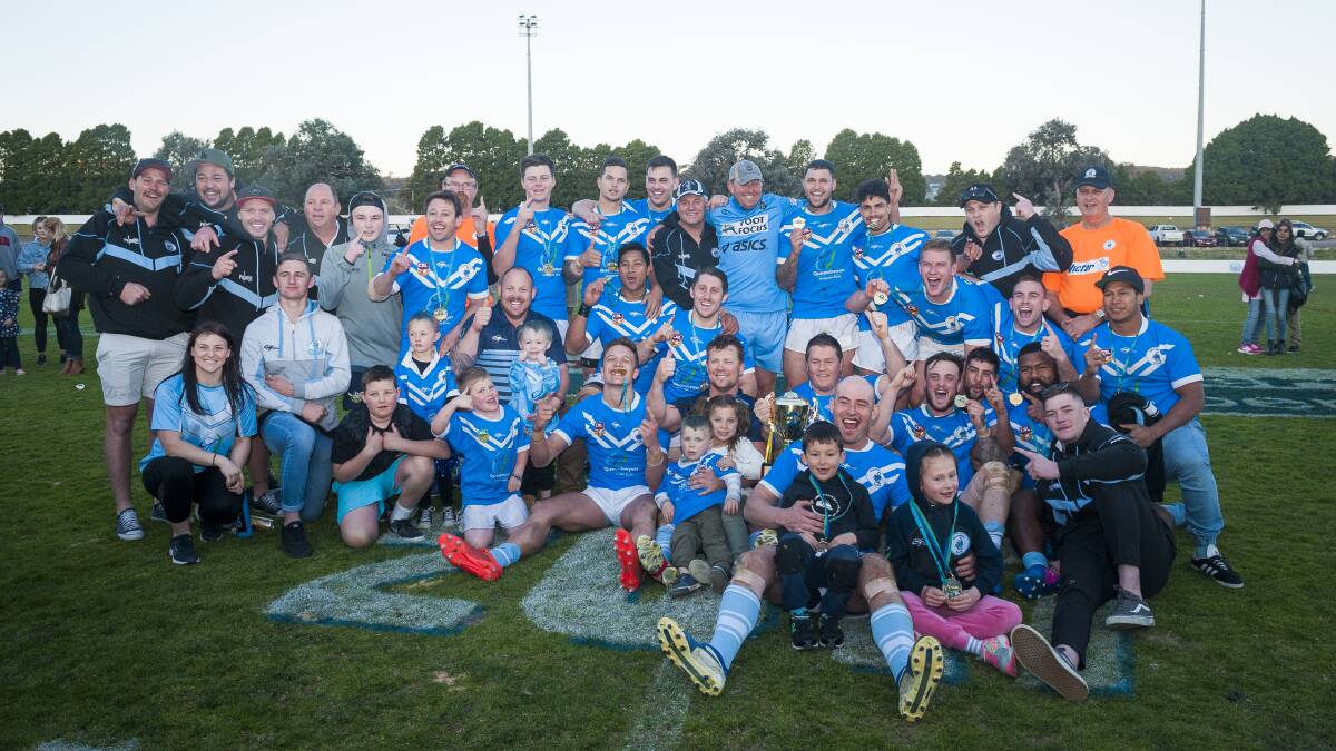 Jamie McInnes (back row, centre, black jumper) with the 2017 Queanbeyan Blues premiership winning side. Photo: Dion Georgopoulos