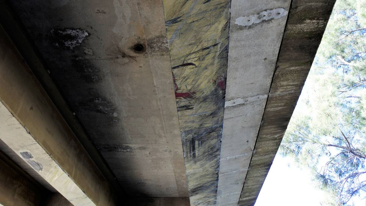 The underside of Queens Bridge has been obviously marked from trucks wedging themselves over the years. Photo: Elliot Williams