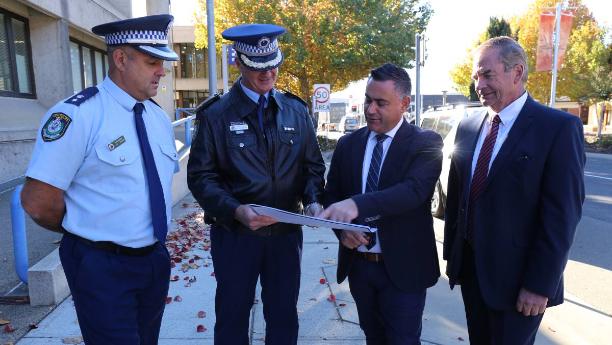 Monaro Commander Paul Condon, Assistant Commissioner Peter Barrie, Deputy Premier John Barilaro and Queanbeyan-Palerang Mayor Tim Overall inspect the new plans. Photo: Supplied