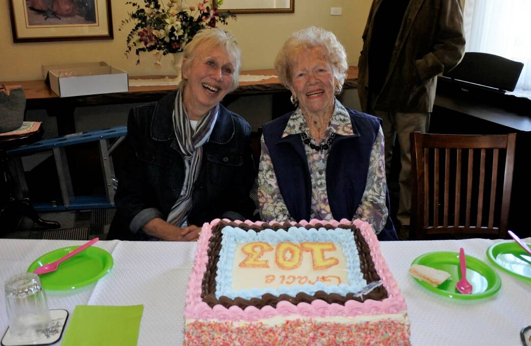 Sandra Lloyd with her mother Gracie Clarke celebrating her 103rd birthday at Warrigal Aged Care in Queanbeyan on Wednesday. Photo: Elliot Williams