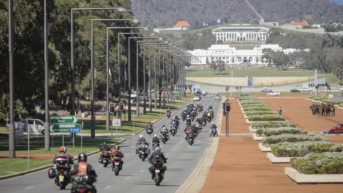 The ACT and NSW Black Dog Ride contingent left from the War Memorial on Tuesday. Photo: Sitthixay Ditthavong