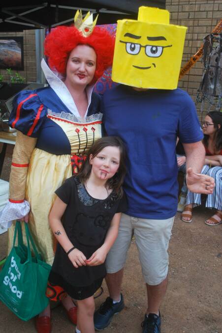 For some reason Queen of Hearts Laura Shelley and Lego Man Jason Johnson stood out in the crowd. Seven-year-old Beth Johnson chose more traditional attire. Photos, Phil Mayne.