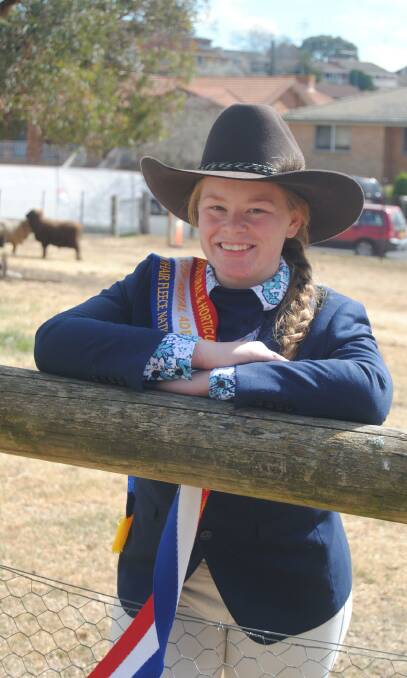 Showing the spoils: Queanbeyan high school Year 12 student Jasmine Shields proudly displays her gong from the Royal Adelaide Show. Photos: Phil Mayne