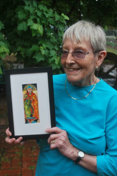 Diane Alder with her watercolour, 'Old stained glass'. Alder took home first prize in Miniatures. Photos, Phil Mayne