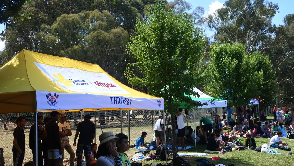 Sun protection: Telopea Park School's new shade gazebos being used at their annual swimming carnival. Photo: Andrew Brown