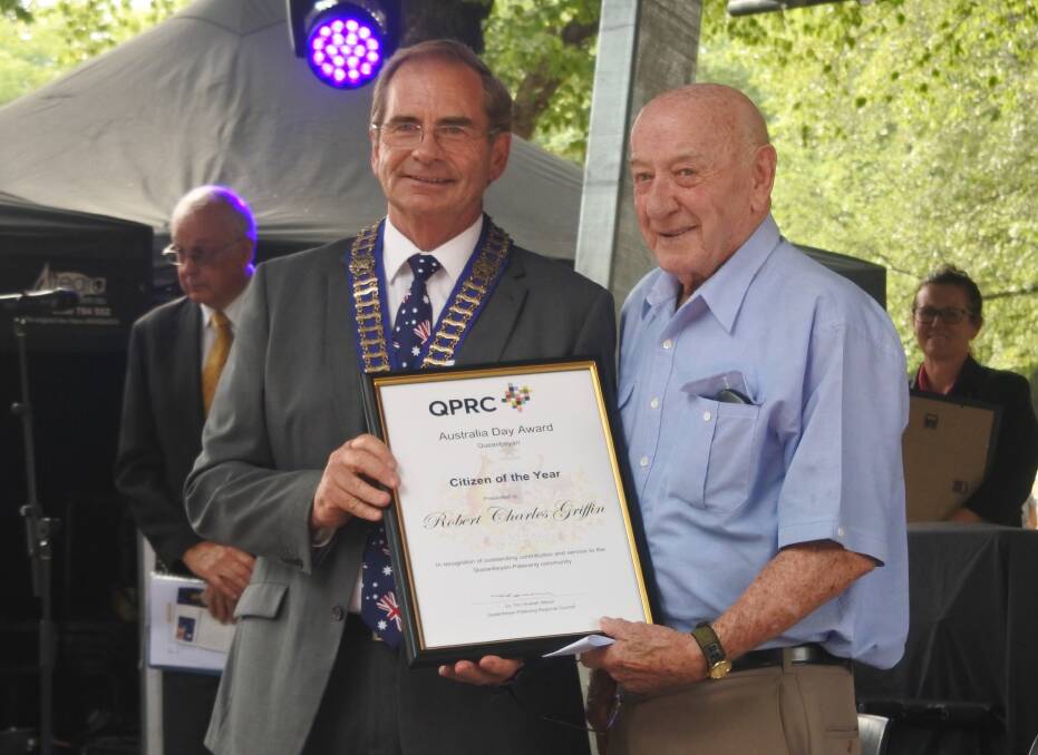 Honoured: Robert "Bobby" Griffin receiving his Citizen of the Year award from mayor Tim Overall on Australia Day. Photo: Andrew Brown