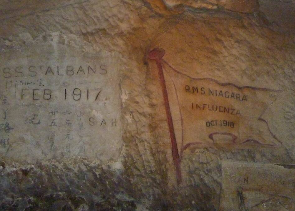 Some of the hundreds of engravings left by passengers of ships that were quarantined at North Head in the 1800s. Picture: Tim the Yowie Man