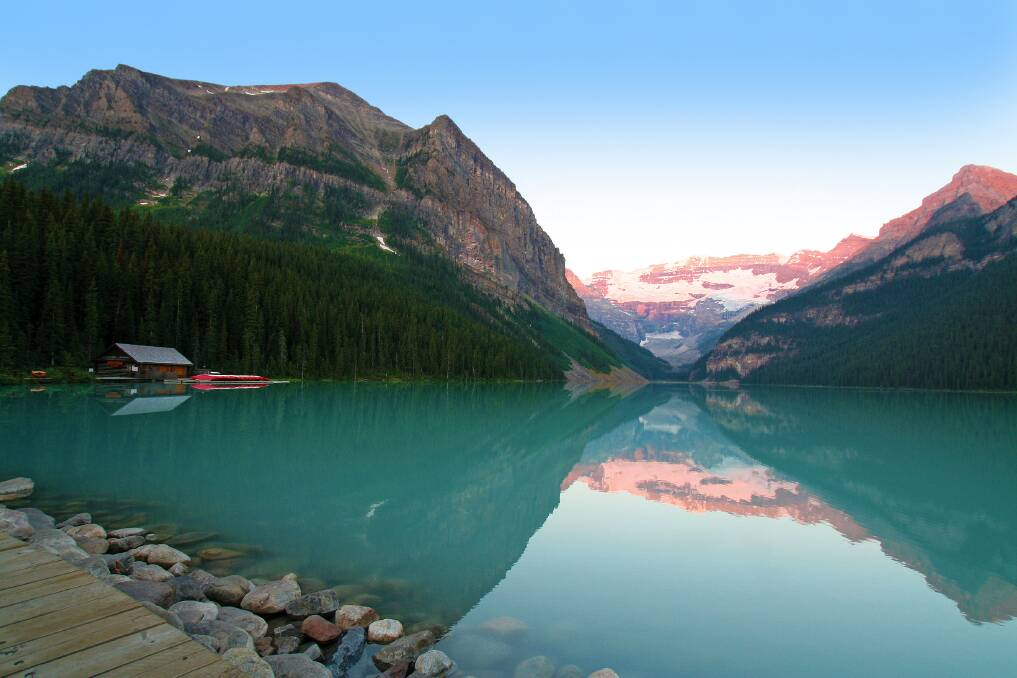 A shot taken just after sunrise at Lake Louise. On an escorted ATP journey you'll also stay in a Lakeview Room at the iconic Fairmont Chateau Lake Louise.