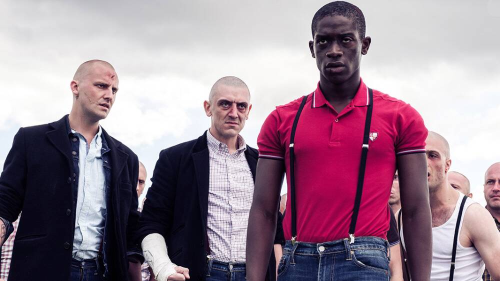 SKIN DEEP: Damson Idris plays Eni, the black member of a racist skinhead group in Britain during the 80s.