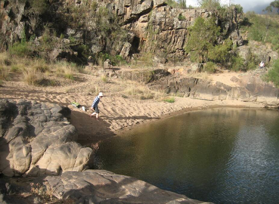 RISK ASSESSMENT: Along the Kambah Pools to Red Rocks Gorge walking track are many delightful swimming spots, but care must be taken at all times. Brett McNamara is with ACT Parks & Conservation Service.