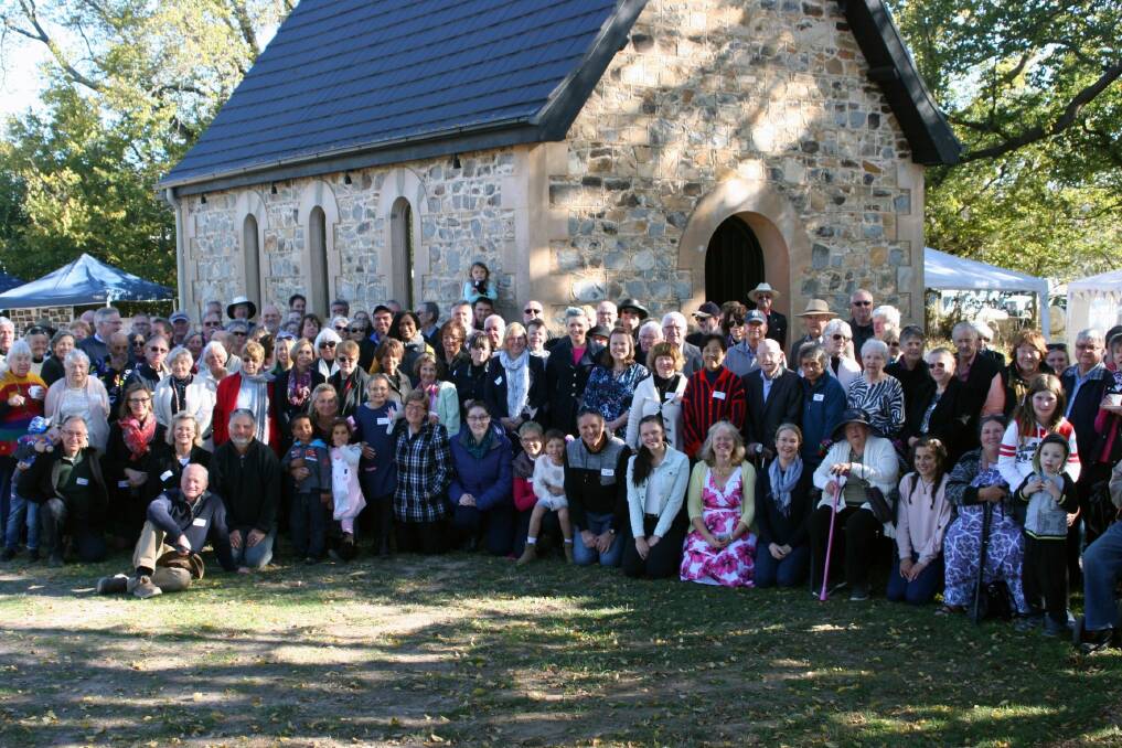 Garden party guests outside St Paul's, Burra to celebrate 150 years.