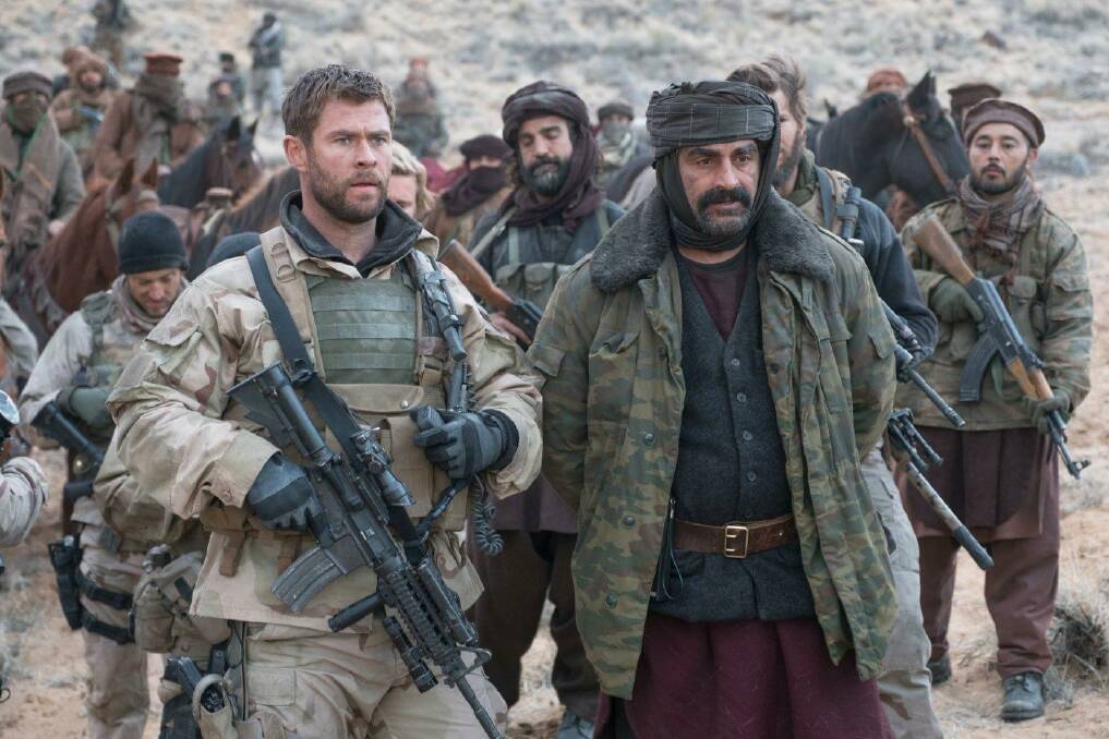 SURPRISINGLY SUBTLE: Chris Hemsworth and Navid Negahban in 12 Strong, an American war film that's a bit smarter than the rest.