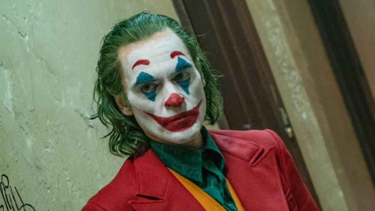 NOT FUNNY: Arthur Fleck (Joaquin Phoenix) puts on a happy face as his mental health disintegrates in Joker.