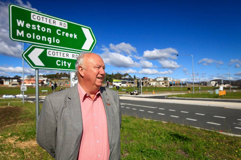 WIN: Weston Creek Community Council chair Tom Anderson in 2014, pictured at the Cotter Road site the council proposed for a new petrol station. The facility is now being constructed.