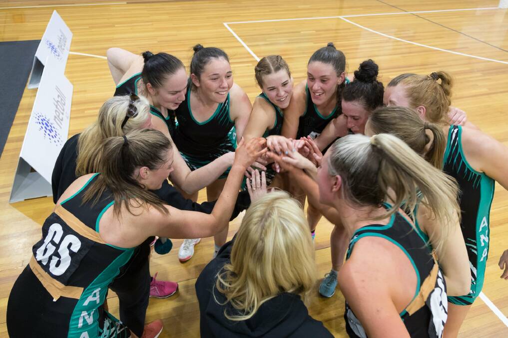 Big win: The Arawang team celebrates a strong victory on Sunday afternoon, following their 69-57 victory over the Canberra Netball Association in the Canterbury State League Division One final. Photo: Ben Southall. 