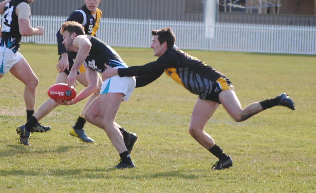 Hang on: The Tigers couldn't stop Belconnen on Saturday. Photo: Burney Wong.