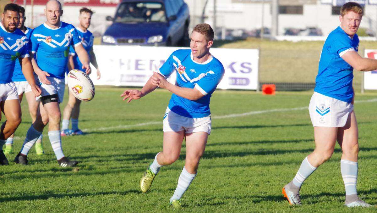 Pass it on: The first half of the match was competitive, until Goulburn began to flag and Queanbeyan picked up their pace. Photo: Darryl Fernance