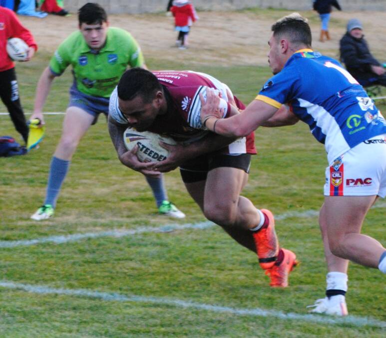 Cross over: Fonua Tonga crosses for one of his three tries, which helped to set up a dominant victory over the Tuggeranong Bushrangers for the Roos, and confirm a finals spot. Photo: Burney Wong. 