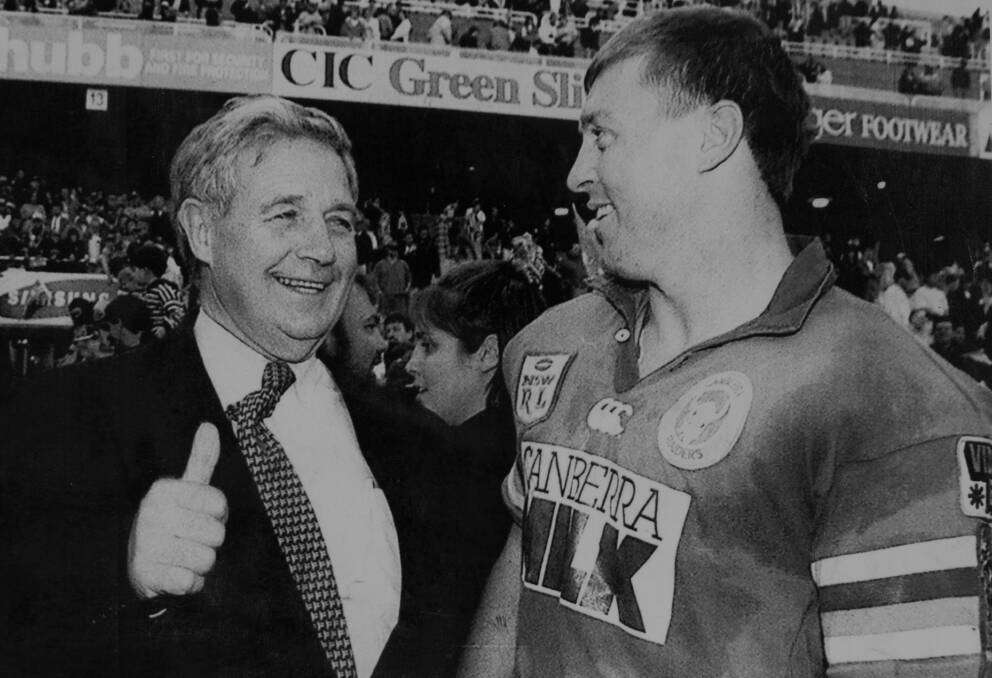 Father and son: Don Furner snr (left) celebrates the Canberra Raiders' grand final win over the Canterbury Bankstown Bulldogs with his son and Clive Churchill medallist, David, in 1994. Photo: Canberra Times. 