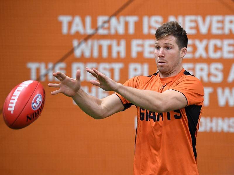 GWS coach Leon Cameron has come to the defence of star Giants forward Toby Greene (pic).